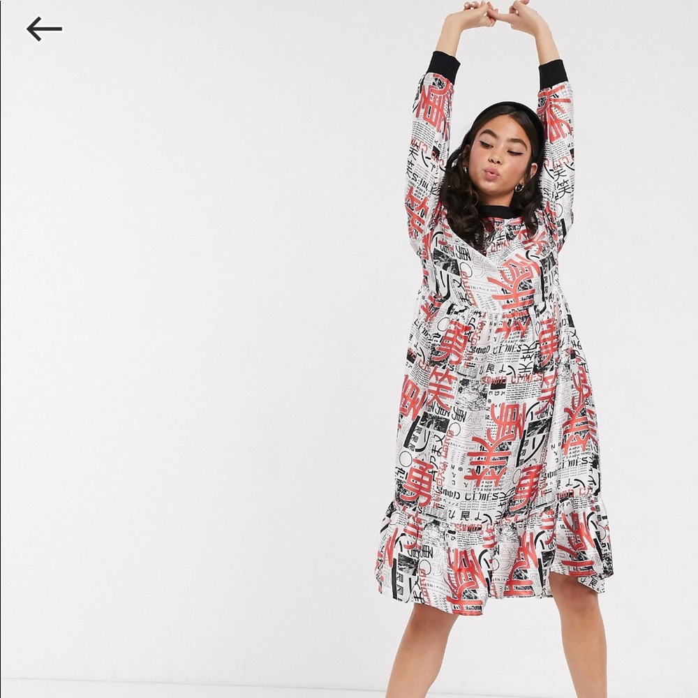 NWOT Collusion newspapers print dress .